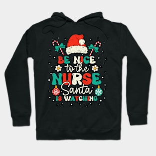 Nurse Christmas Groovy Nice To The Nurse Santa is Watching Hoodie